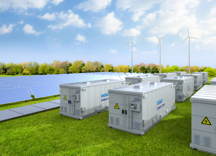 Battery energy storage units beside a solar farm